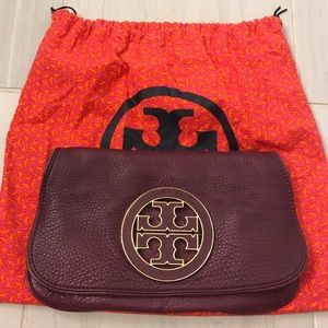 Tory Burch plum clutch, wristlet